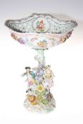 Dresden porcelain centre piece with pastoral couple and flower decoration, 33cm.