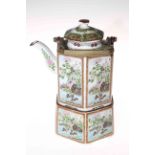 Ornate Chinese teapot and stand.