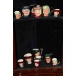 Thirteen Royal Doulton character jugs including Town Crier, Cardinal.