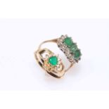 Two emerald rings set in 9 carat gold.