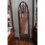 Walnut arched top cheval mirror, 43cm by 157cm.