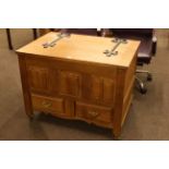 Oak two drawer storage box with linen fold panel front, 91cm by 68.5cm.
