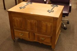 Oak two drawer storage box with linen fold panel front, 91cm by 68.5cm.