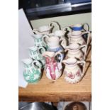 Two sets of three Victorian graduated relief moulded jugs,