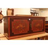 Rectangular mahogany two handled coffee table and painted two door entertainment cabinet.
