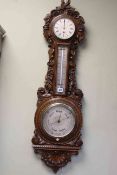 Impressive Victorian carved oak aneroid barometer, clock and thermometer, Dolland, London,