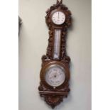 Impressive Victorian carved oak aneroid barometer, clock and thermometer, Dolland, London,