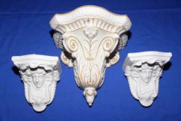 Pair Victorian Parian mask wall brackets, and large wall bracket with gilt decoration,