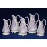 Collection of five Samuel Alcock lavender on white Parian jugs decorated with Naomi and her