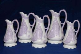 Collection of five Samuel Alcock lavender on white Parian jugs decorated with Naomi and her
