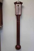 Reproduction mahogany stick barometer, length 94cm.