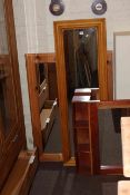 Two pine framed wall mirrors and hardwood mirror-shelf unit (3).