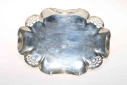 Silver dish with part pierced shaped border, Sheffield 1937, 23cm across.