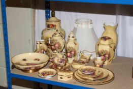 A nice collection of Aynsley Orchard Gold including lamp with shade, lidded vases, biscuit jar,