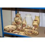 A nice collection of Aynsley Orchard Gold including lamp with shade, lidded vases, biscuit jar,