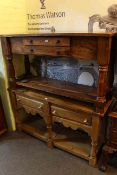 Two hardwood two drawer side tables.