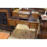Shoolbred inlaid mahogany writing desk having mirror back flanked by four drawers,