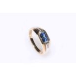 Sapphire and six stone diamond ring set in 9 carat gold.