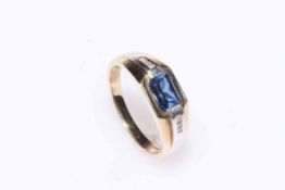 Sapphire and six stone diamond ring set in 9 carat gold.