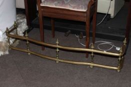 Victorian brass rail fender.