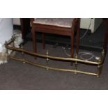 Victorian brass rail fender.