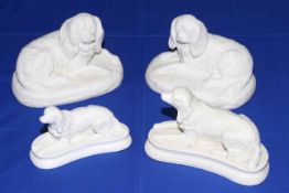 Pair Victorian Parian King Charles Spaniels on cushions and two Spaniels (4).