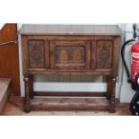Period style carved jointed oak single door side cabinet on turned legs bearing label for Marsh,