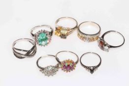 Collection of eight silver gem set rings.