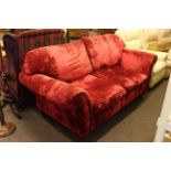 Two seater settee in wine crushed velour.
