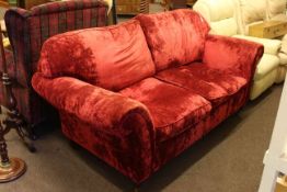 Two seater settee in wine crushed velour.