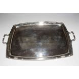 Large silver two handled tea tray of curved sided rectangular shape, Sheffield 1942, 62cm across.