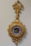 Ornate gilt cased aneroid barometer, length 54cm.