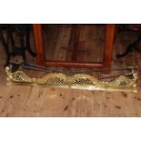 Good Victorian brass fender, pierced and with scroll decoration,