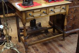 Oak two drawer side table on turned legs, 92cm by 76.5cm.