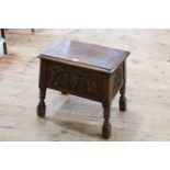 Carved oak sewing box stool, 48cm by 45cm.