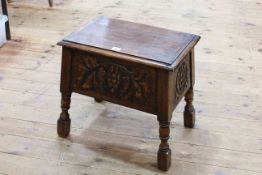 Carved oak sewing box stool, 48cm by 45cm.