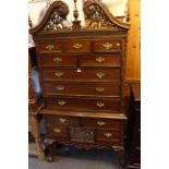 Reproduction carved hardwood thirteen drawer chest on chest with swan neck pediment, 101.