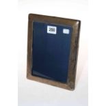 Silver mounted easel photograph frame, 22cm by 17cm.