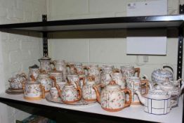 Collection of Victorian Brownhills Pottery including teapots and jugs with bamboo style design,