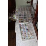Two fly fishing perspex cabinets with approximately 1500 flies.