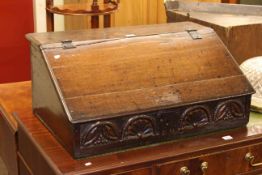 Antique oak bible box, the slide front lid enclosing five drawers, 72cm by 31cm.