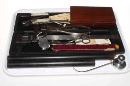 Tray lot with cased veneer scale measure, boxed drawing instruments, ivory rules, sugar cutters,