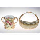 Royal Worcester blush two handled loving cup and moulded basket (2).