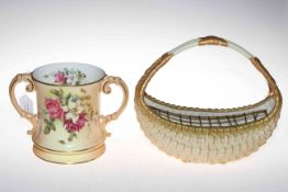 Royal Worcester blush two handled loving cup and moulded basket (2).
