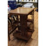 Edwardian mahogany and satinwood banded two tier revolving bookcase, 47cm by 87.5cm.