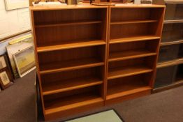 Pair teak open bookcases, 81cm by 133cm and teak CD tower (3).