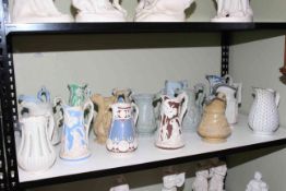 Collection of sixteen Victorian relief moulded jugs, including Ridgeway, Charles Meigh,