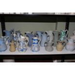 Collection of twenty one Victorian relief moulded jugs, mostly stoneware including Charles Meigh,