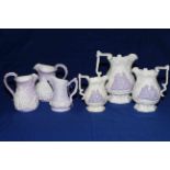 Six Samuel Alcock lavender on white Parian graduated jugs with Arab figures;
