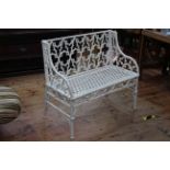 Coalbrookedale style cast garden bench, 98cm by 86cm.